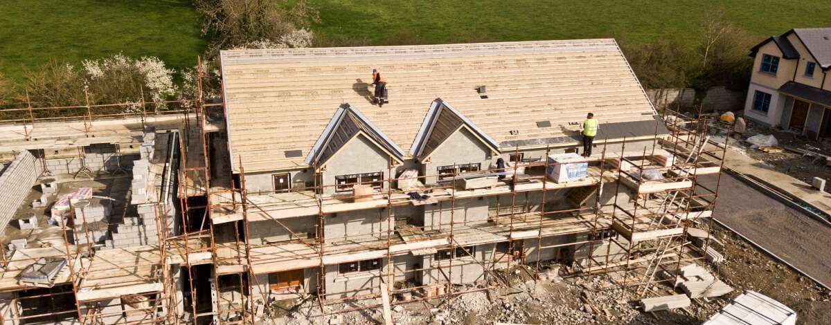 Ongoing large-scale roofing project for a residential property in Buffalo, NY.